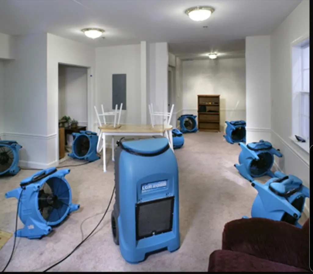 Air movers and dehumidifier setup for Water Damage Restoration in Bruce